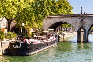Houseboat near Pont Marie, Ile Saint-Louis, Paris, France.