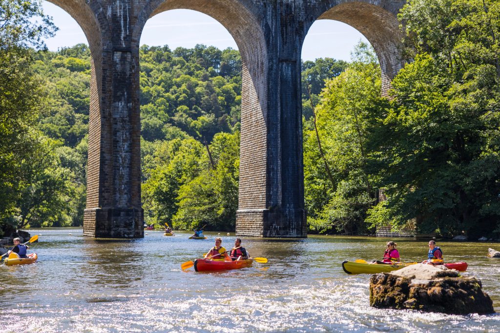 Canoeing on the Orne River in Clecy on a sunny spring day