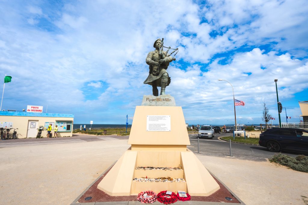 Statue and memorial for Piper Bill Millin. At Sword beach, normandy, France.